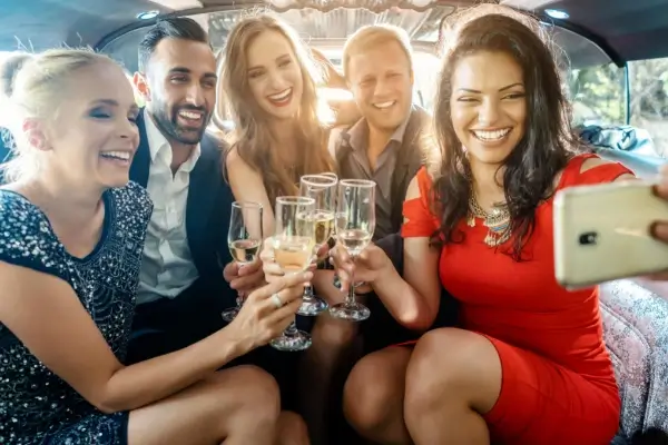 Couple celebrating anniversary in limousine